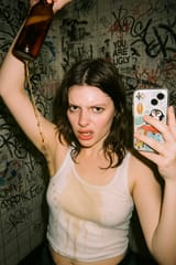 20250624_2307_Chaotic Punk Bathroom Selfie_remix_01jyjgpxj0fd7v6mx7jdx8zxxd
