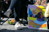 A Biden-Harris supporter Converse shoes and poster seen during a watch party for the Presidential Inauguration ceremony at Manuel&#039;s Tavern on January 20, 2021 in Atlanta, Georgia-1230694894