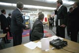 President_George_W._Bush_watches_Television_Coverage_of_Terrorist_Attacks