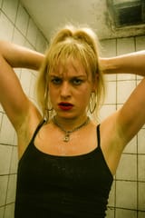 20250706_2235_Candid Punk Bathroom Moment_remix_01jzhbpp42fhfabqry5syfcapw