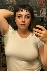 20250614_1648_Grunge Bathroom Selfie_remix_01jxr345gtewc8dg6qaw6zsxj4