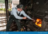 sooty-stoker-shoveling-coal-furnace-steam-engine-jesenice-slovenia-june-th-train-carrying-tourists-old-73240302-2091562944