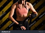stock-photo-close-up-of-a-woman-doing-boxing-bandages-in-a-fighting-cage-1202179621
