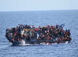 migrant-ship-capsizing-libyan-coast-cred-italian-navy-via-afp