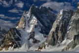 Trekkers_along_with_porters_towards_Snow_Lake%2C_over_Biafo_Glacier_61Km