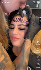 trump forehead tattoo