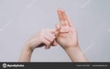 depositphotos_665152406-stock-photo-provocative-gesture-fuck-woman-hands