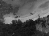 Two_crashed_U.S._Air_Force_CH-53_helicopters_on_Koh_Tang,_1975