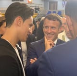 macron talking to women