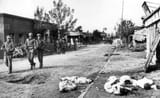US soldiers patrol a street, October 1950 of the Korean war