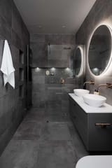 cave-inspired-grey-bathroom-with-walk-in-shower