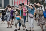 130517141050-china-tourists-hong-kong-camera