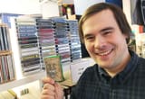man holding cassette