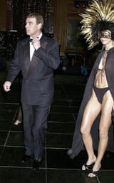 prince-andrew-escorted-by-masked-girl-440nw-375881bj