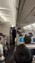 white expat tries to open korean air door midflight_thumb.jpg