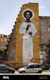 uno-scatto-verticale-di-san-benedetto-il-moror-nel-mercato-di-ballaro-di-palermo-sicilia-un-saint-graffiti-street-art-2jrhg0m