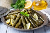 delicious-dolma-sarma-stuffed-grape-leaves-rice-lebanese-dolma-sarma-plate-lebanon-turkish-greek-middle-eastern-cuisine-turkish-name-yaprak-sarma_693630-4729