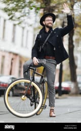 casual-handsome-hipster-man-riding-bike-and-waving-hello-RD6NCA[1]