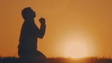 videoblocks-silhouette-young-man-praying-outside-at-beautiful-sunset-male-asks-for-help-finding-solace-in-faith-concept-religion_hss1fhph4_thumbnail-1080_01