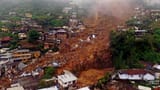 f_mo_lon_brazilflood_220216-u55s0u