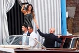 protestors-push-jeff-bezos-dummy-clutching-an-amazon-box-v0-eqsc5x6rka9f1
