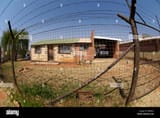 stock-photo-modest-home-property-in-south-africa-2184620348
