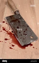 butchers-cleaver-with-blood-DGP8MN