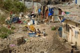 mumbai-india-february-indian-children-playing-street-near-garbage-dharavi-slum-top-view-169016930