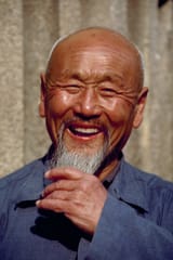asian man laughing