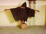 The-Photo-of-an-Iraqi-Hooded-Detainee-in-Abu-Ghraib-Prison