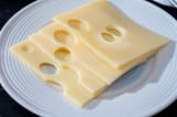 swiss-cheese-collection-yellow-emmentaler-emmental-cheese-round-holes-swiss-cheese-collection-yellow-emmentaler-310841236