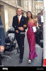 argentinian-former-tennis-player-guillermo-vilas-and-his-wife-pictured-arriving-at-the-greek-orthodox-sain...lie-nastase-58-celebrated-his-wedding-with-amalia-teodosescu-28-on-saturday-june-5-2004-photo-by-guerin-kleinabaca-2EA8AXW