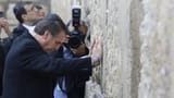 _106213888_bolsonaromuroreuters[1]