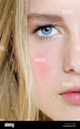 female-dark-blonde-hair-blue-eyes-natural-looking-make-up-CEKJ6B
