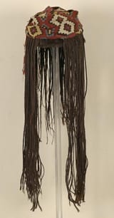 Polychrome turban with geometric design and braided human hair