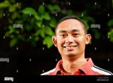 handsome-and-healthy-southeast-asian-young-adult-man-in-casual-shirt-looking-and-smiling-2AGF15E