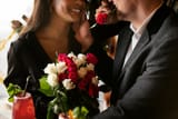 young-woman-having-bouquet-roses-from-her-boyfriend_23-2149161980