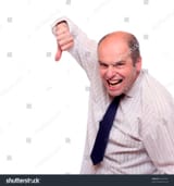stock-photo-angry-manager-giving-a-thumbs-down-54678301