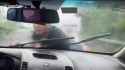 Chinese man on car_thumb.jpg