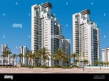 new-modern-high-rise-residential-buildings-under-blue-sky-in-city-of-ashdod-israel-2G02JB6