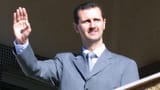 GTY_bashar_al_assad_balcony_tk_130829_16x9_1600