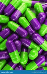 pills-medication-capsules-green-purple-pile-capsule-shining-103529591