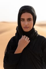 woman-wearing-hijab-desert_23-2149197971