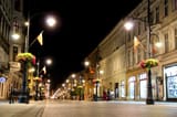 view-evening-city-from-main-touristic-street-polish-city-lodz-piotrkowska-night-people-relax-lodz-piotrkowska-street-people-relax-cafe_929087-10684