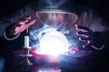 wizard-hood-lights-smoke-magic-crystal-ball-white-desk-candle-candlestick-old-books-predicting-future-125123269[1]