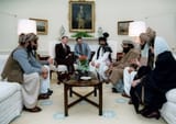 Reagan_sitting_with_people_from_the_Afghanistan-Pakistan_region_in_February_1983