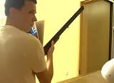 Andrei_Zeltser_with_shotgun