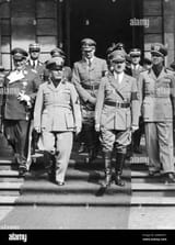 hermann-goring-italian-prime-minister-benito-mussolini-rudolf-hess-in-the-background-german-chancellor-adolf-hitler-italian-minister-of-foreign-affairs-galeazzo-ciano-1938-2WW34T1