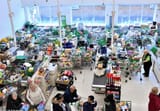 25978502-8113007-Trolleys_piled_high_for_delivery_are_seen_as_shoppers_queue_at_t-m-102_1584234871874