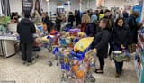 25965752-8113007-Shoppers_stand_in_queues_by_the_tills_in_Tesco_Extra_in_Surrey_Q-a-103_1584236061120